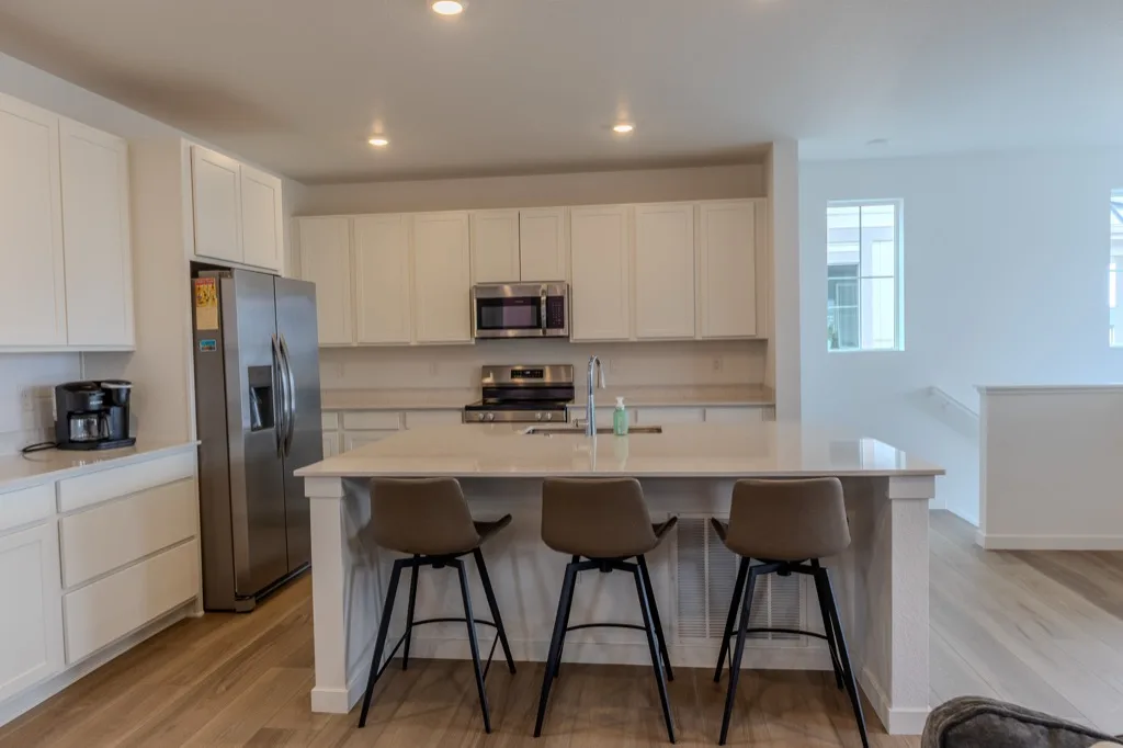 Kitchen with bare countertops before virtual staging